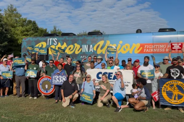 Group standing in front of bus on the Better in a Union Bus Tour in Croton Point Park